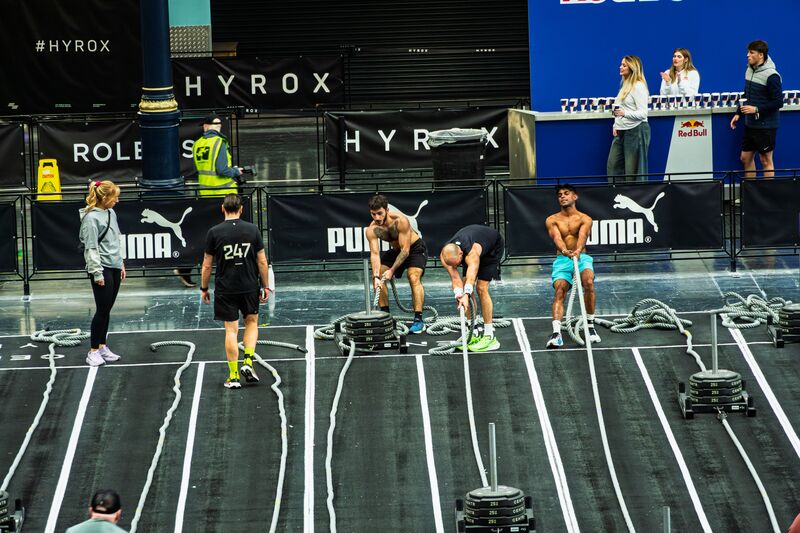 Competitors on the sled push lanes at HYROX, Olympia London